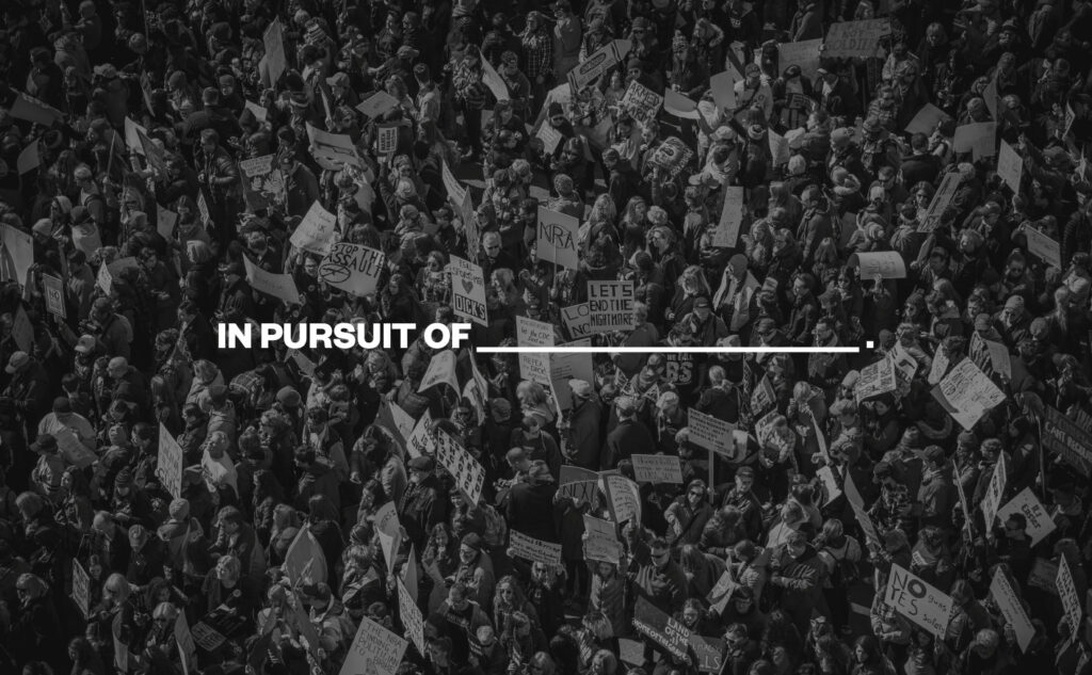 An aerial black and white photo of a large protest, demonstrating how nonprofits use imagery to showcase social movements and activism.